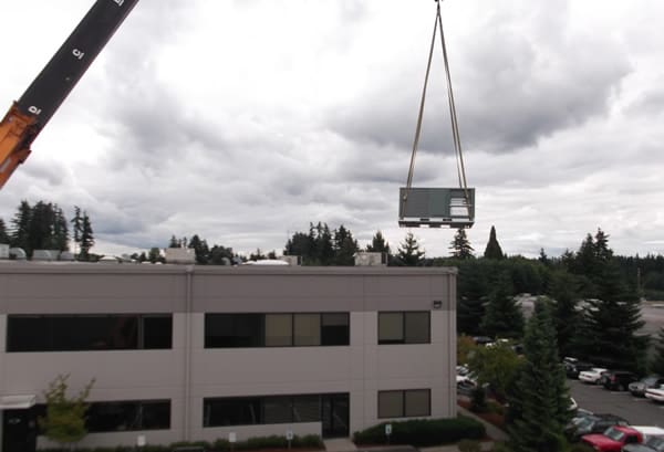 HVAC Rooftop being craned to roof